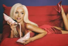 Christina Aguilera explica la razón detrás de su rodilla lastimada.