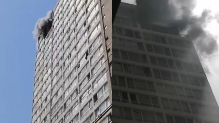 Incendio en edificio del centro de Santiago afecta pisos superiores. Emergencia en curso.